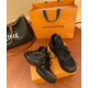 L Archlight Chunky Monogram Trainers In Black And Brown Angled View L Archlight chunky monogram trainers in black and brown angled to display sole curves