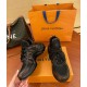 L Archlight Chunky Monogram Trainers In Black And Brown Three-Quarter View L Archlight chunky monogram trainers in black and brown shown from a three-quarter angle