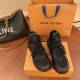 L Archlight Chunky Monogram Trainers In Black And Brown Front View L Archlight chunky monogram trainers in black and brown displayed from the front on a box