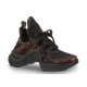 L Archlight Chunky Monogram Trainers In Black And Brown Studio View L Archlight chunky monogram trainers in black and brown presented in studio side profile