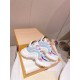 Boxed pair of L Archlight Chunky Trainers in blue, pink, and white Pair of L Archlight Chunky Trainers in blue, pink, and white inside a box