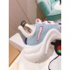 Heel detail of L Archlight Chunky Trainers in blue, pink, and white Close-up of the heel and sole of L Archlight Chunky Trainers in blue, pink, and white