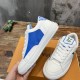 L Charlie Low Top Leather Trainers in white, blue and green showing the blue side panel L Charlie Low Top Leather Trainers in white, blue and green showing the blue side panel