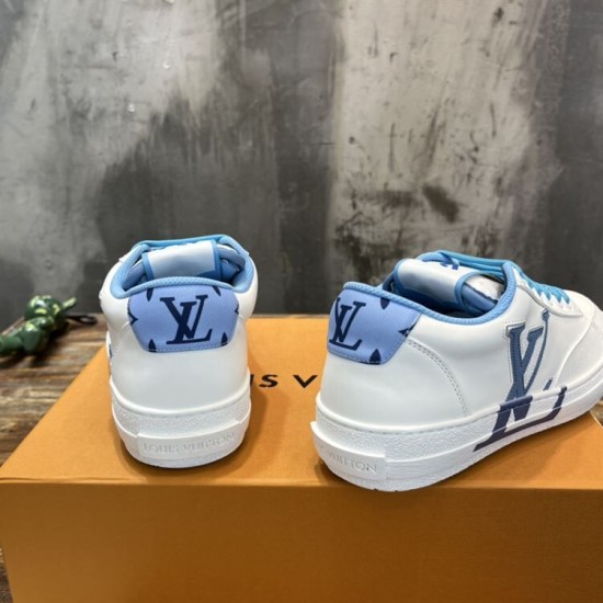L Charlie Low Top Leather Blue Accent Trainers Heel View in blue and white L Charlie Low Top Leather Blue Accent Trainers rear heel counter view with blue branding in blue and white
