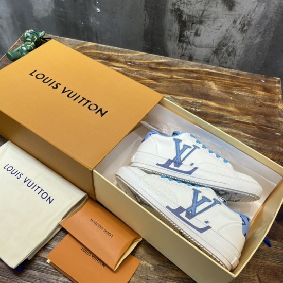 L Charlie Low Top Leather Blue Accent Trainers Boxed Display in blue and white L Charlie Low Top Leather Blue Accent Trainers displayed inside luxury packaging box in blue and white