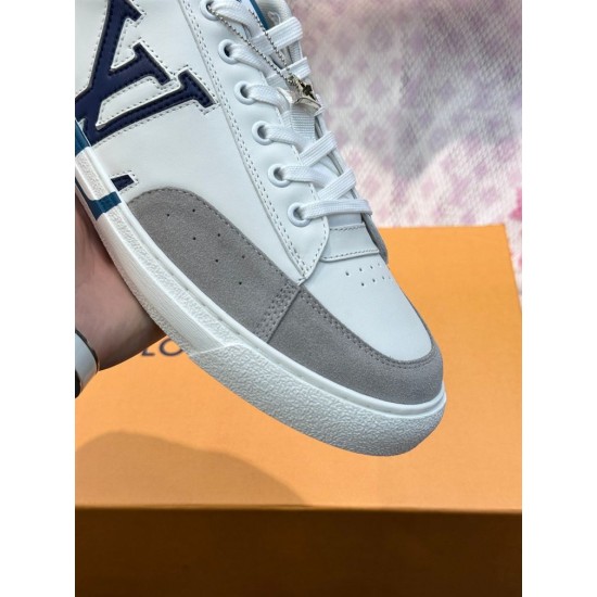 Close-Up of L Charlie Grey Suede Toe Cap and Laces in white Close-up of the grey suede toe cap and lacing system on L Charlie trainer in white