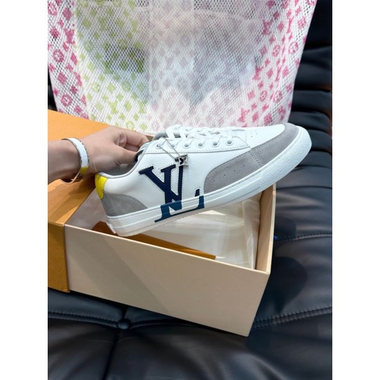 Single L Charlie Trainer Side Profile in white Single L Charlie trainer held up showcasing the side logo and sole in white