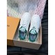 L Charlie Low Top Leather Trainers In White And Green - In Box L white and green leather trainers positioned inside an open branded presentation box