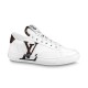 L Charlie White Low Top Trainer Profile View L Charlie white low top leather trainer featuring side monogram logo on a plain background