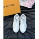 L Charlie White Leather Trainers Top View Top-down view of white L Charlie trainers showing white laces and branded grey tongue tags