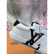 L Charlie White Trainer Monogram Detail Detailed view of brown monogram side logo and silver charm on white L Charlie trainer