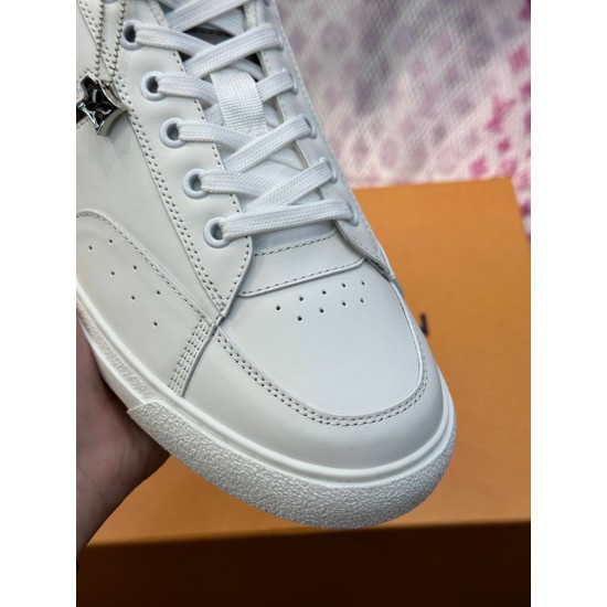 L Charlie White Trainer Toe Box Detail Close-up of white leather toe vamp with perforations and stitching on L Charlie trainer