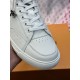 L Charlie White Trainer Toe Box Detail Close-up of white leather toe vamp with perforations and stitching on L Charlie trainer