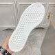 Outsole Tread View of L White Leather Low Top Trainers Under-sole view of L white leather low top trainers displaying textured tread pattern