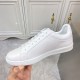 Outer Side Panel View of L White Leather Low Top Trainers Outer side of L white leather low top trainers highlighting smooth leather panels