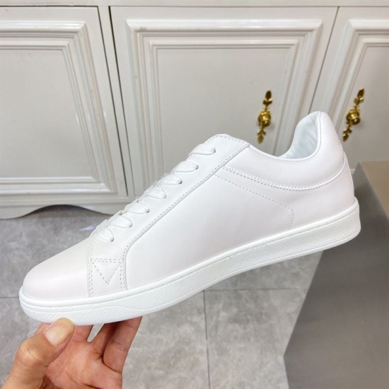 L Classic Leather Trainers Clean Side View in white and blue Side profile of L white leather trainers highlighting smooth finish in white and blue