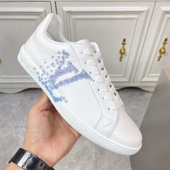 L Classic Leather Trainers Angled View in white and blue Angled side view of L white leather trainers with blue side graphic