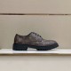 L Monogram Canvas Derby Shoes In Brown Side Angle in brown and black Lateral exterior view of brown patterned Derby shoe on display surface in brown and black