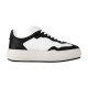 L Groovy Platform Leather Trainers In Black And White - Studio Side View Studio side profile of L Groovy Platform Leather Trainers In Black And White showcasing clean lines
