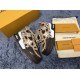 L Skate Sneaker pair with brown snakeskin pattern Pair of L Skate Sneakers in brown snakeskin pattern with packaging