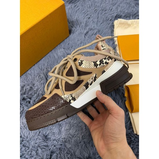 L Skate Sneaker angled view in brown snakeskin pattern Angled view of the L Skate Sneaker in brown snakeskin pattern