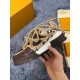 L Skate Sneaker angled view in brown snakeskin pattern Angled view of the L Skate Sneaker in brown snakeskin pattern