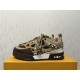 L Skate Sneaker side view in brown snakeskin pattern Side view of the L Skate Sneaker in brown snakeskin pattern