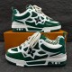 L Skate Sneaker Green White Low Top Trainers Box Display Dual angle layout of the L Skate Sneaker Green White Low Top Trainers on an orange box