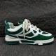 L Skate Sneaker Green White Low Top Trainers Side View Lateral side profile of the L Skate Sneaker Green White Low Top Trainers on dark texture