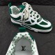 L Skate Sneaker Green White Low Top Trainers Collar Detail Close up of the interior collar and tongue branding of the green and white trainers