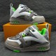 L Skate Grey Green Leather Chunky Trainers Box Display Pair of L skate grey green leather chunky trainers resting on an orange box