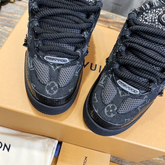 Close-up of the toe box and lace branding on black L skate shoes trainer Close-up of the toe box and lace branding on black L skate shoes trainer