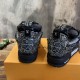 Rear view of black L skate shoes trainers highlighting crystal-covered heels Rear view of black L skate shoes trainers highlighting crystal-covered heels