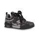 Studio side angle of black L skate shoes trainer against a plain background Studio side angle of black L skate shoes trainer against a plain background