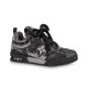 Studio side profile of black L skate shoes trainer with crystal embellishments Studio side profile of black L skate shoes trainer with crystal embellishments