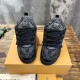 Front view of black L skate shoes trainers showing laces and padded tongues Front view of black L skate shoes trainers showing laces and padded tongues
