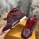 Inner side view of L Skate burgundy leather low top trainers in burgundy and white
