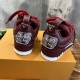 Rear view showing heel embroidery on L Skate burgundy leather trainers in burgundy and white