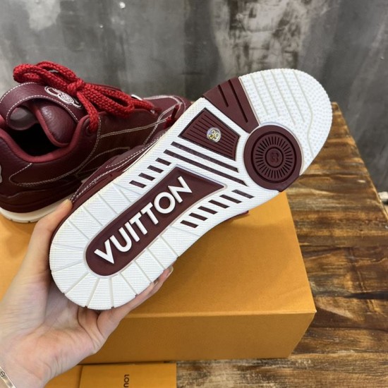 Underside view of the rubber outsole on L Skate burgundy trainers in burgundy and white