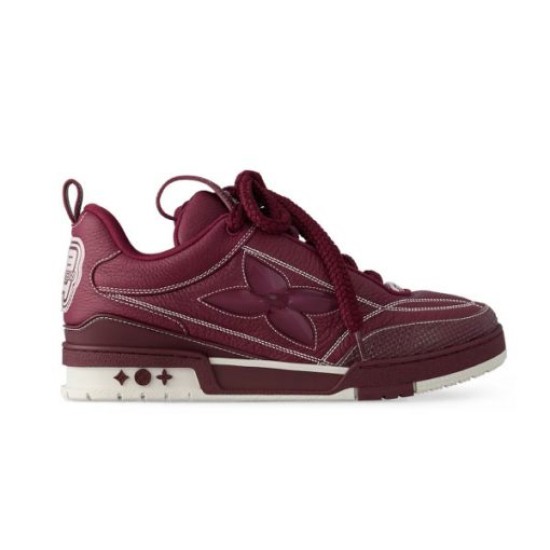 Studio profile view of L Skate burgundy leather low top trainers in burgundy and white