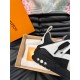 L skate sneaker in black and white leather close up heel detail L skate sneaker in black and white leather close up heel detail