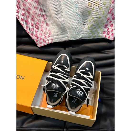 L skate sneaker in black and white leather top angled view in box L skate sneaker in black and white leather top angled view in box