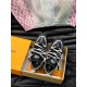 L skate sneaker in black and white leather top angled view in box L skate sneaker in black and white leather top angled view in box