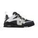 L skate sneaker in black and white leather studio side profile L skate sneaker in black and white leather studio side profile