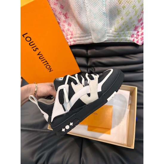 L skate sneaker in black and white leather side profile held up L skate sneaker in black and white leather side profile held up