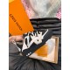 L skate sneaker in black and white leather side profile held up L skate sneaker in black and white leather side profile held up