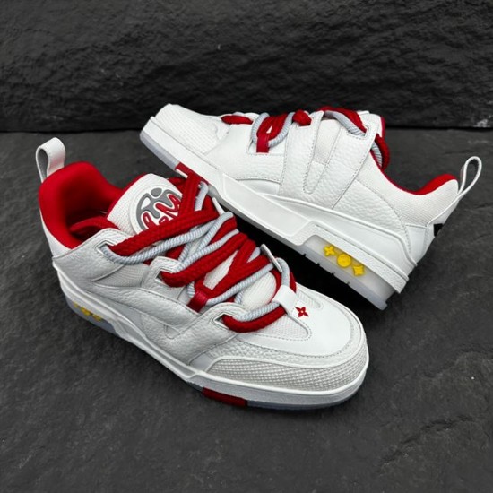 Dynamic angle shot of L Skate Leather Trainers in white and red arranged together