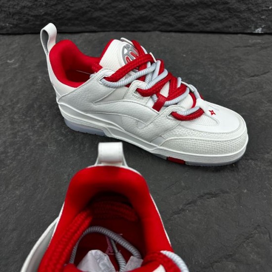 Angled view focusing on the tongue and chunky laces of white and red trainers