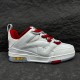 Lateral side view of L Skate Leather Trainers in white and red showcasing the midsole