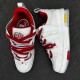 Top-down view of L Skate Leather Trainers in white and red highlighting thick laces